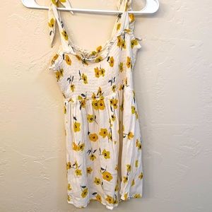 White Billabong Romper with Yellow Flowers
